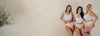 3 Frauen stehen lachend nebeneinander und präsentieren die Shapewear Lower Belly Shaper